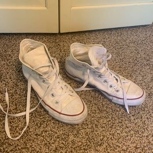 Gently used white height top converse